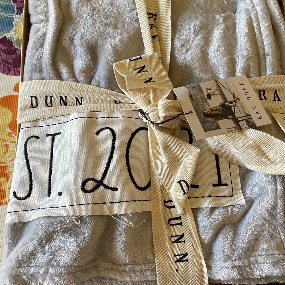 Light grey Rae Dunn throw